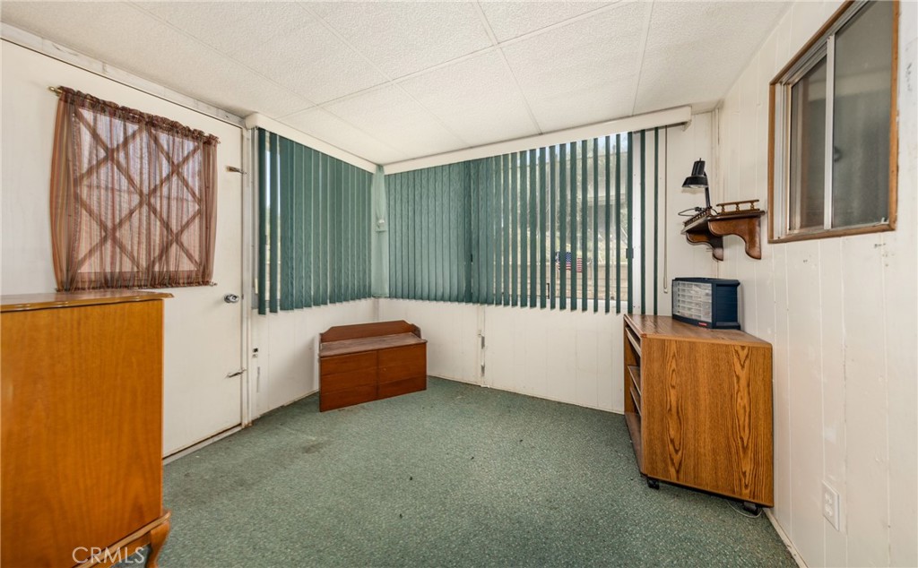 9401 Sharondale Road Calimesa, CA 92320 - Photo 21 of 23 a living room with furniture and a window