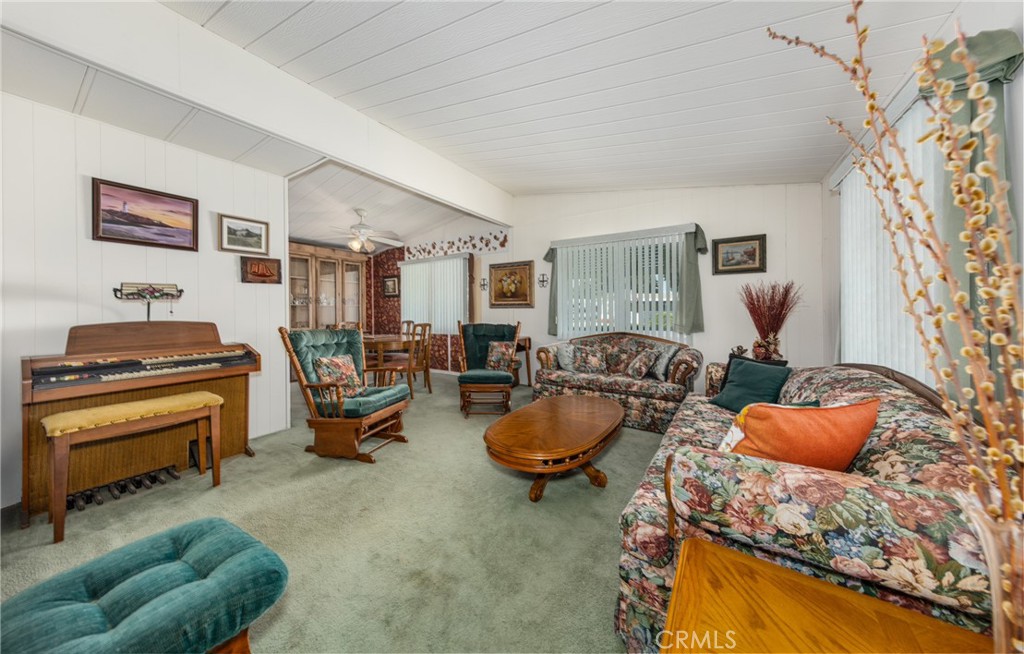 9401 Sharondale Road Calimesa, CA 92320 - Photo 7 of 23 a living room with furniture and a piano