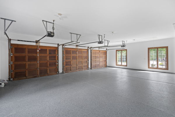 1 Hidden Lake Drive Burr Ridge, IL 60527 - Photo 13 of 24 a view of a livingroom with furniture and windows