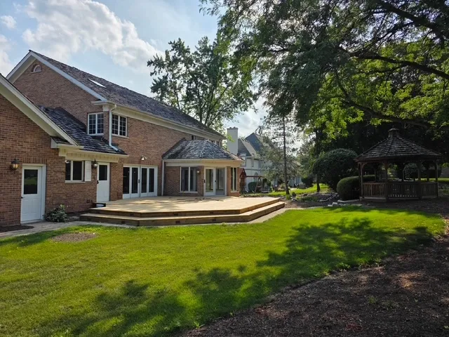 an aerial view of a house having yard