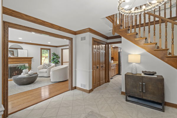 1 Hidden Lake Drive Burr Ridge, IL 60527 - Photo 3 of 24 a view of living room filled with furniture and stairs