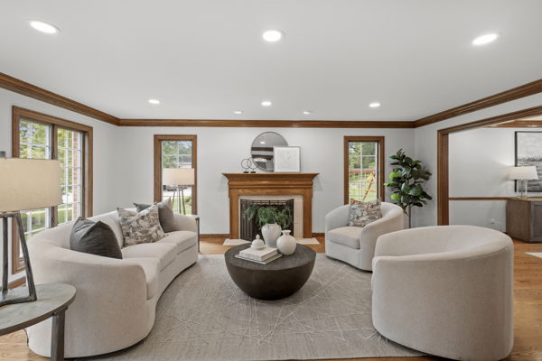 1 Hidden Lake Drive Burr Ridge, IL 60527 - Photo 4 of 24 a living room with furniture and a fireplace