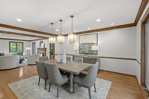 1 Hidden Lake Drive Burr Ridge, IL 60527 - Photo 5 of 24 a view of a dining room with furniture window and wooden floor