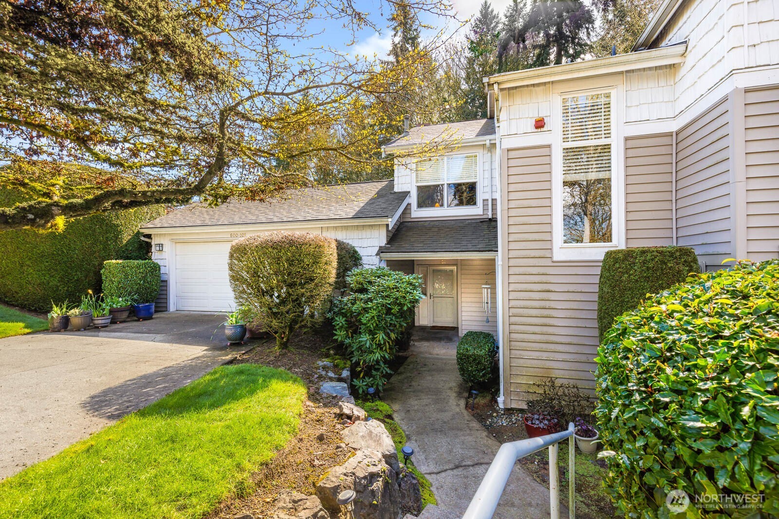 front view of a house with a yard