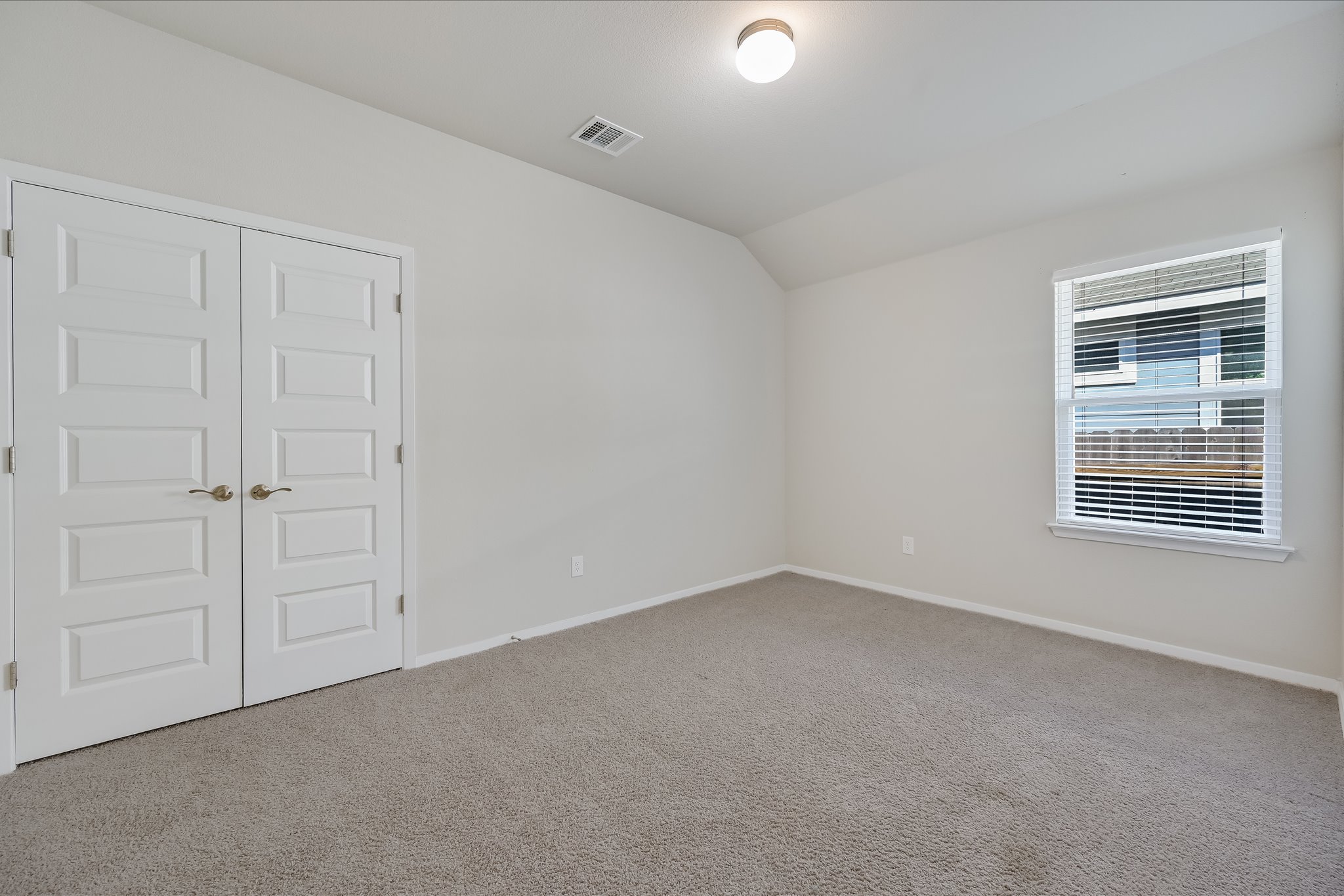 201 Spiny Lizard Lane San Marcos, TX 78666 - Photo 15 of 20 an empty room with a window
