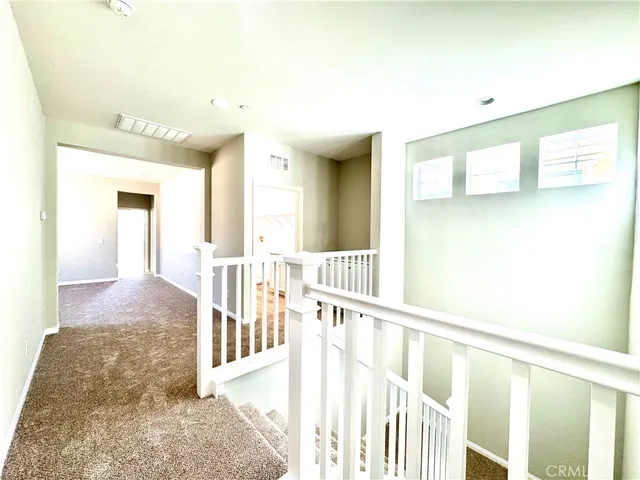 workspace with wooden floor and windows