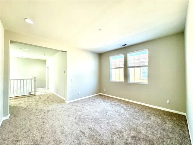 an empty room with a natural light