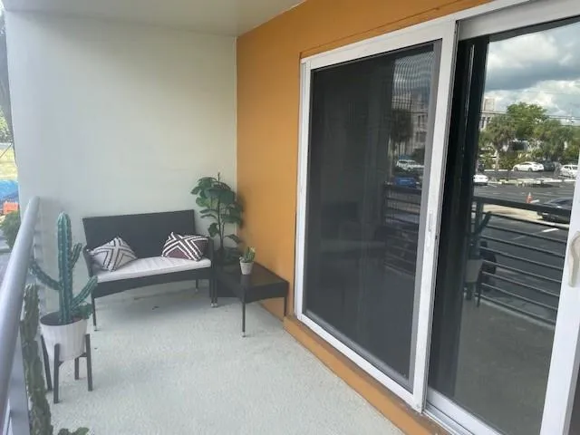 a bench sitting in front of a window