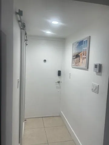 a view of room with hallway