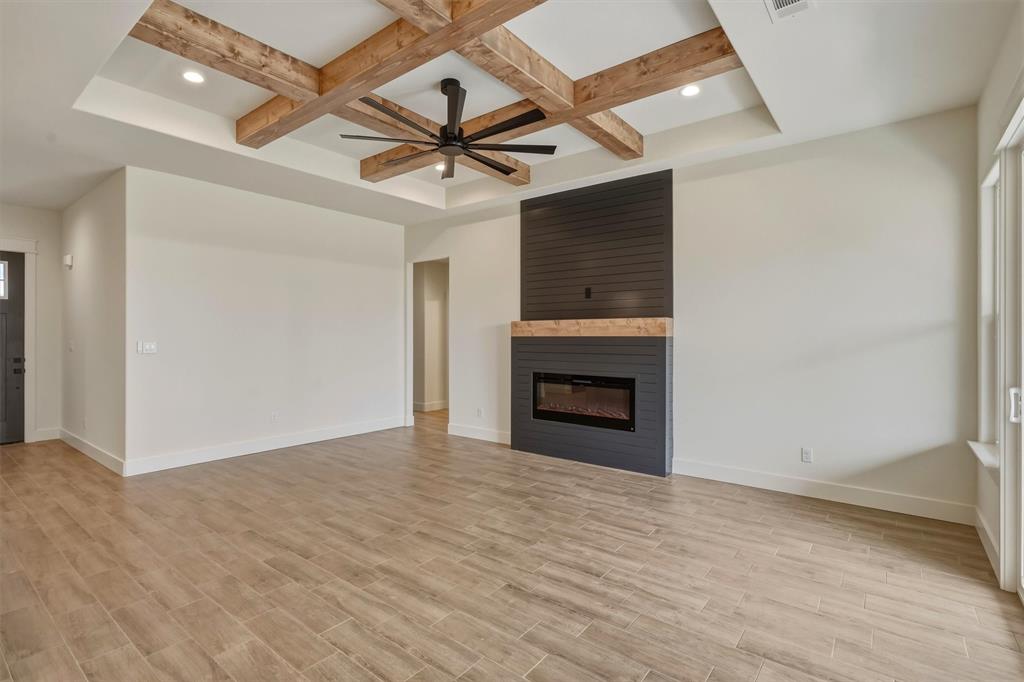 421 Red Bud Lane Tolar, TX 76476 - Photo 18 of 40 an empty room with fan and windows
