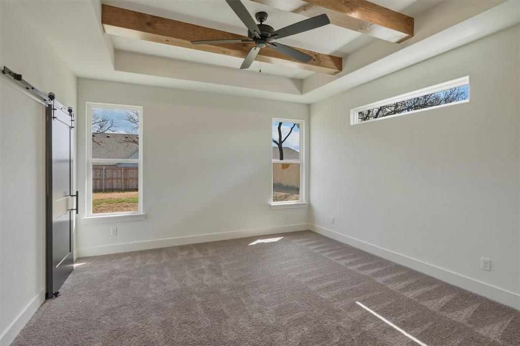 421 Red Bud Lane Tolar, TX 76476 - Photo 19 of 40 a view of an empty room with a window