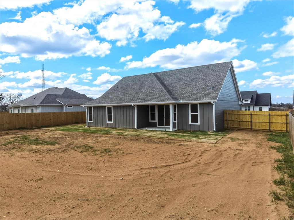 421 Red Bud Lane Tolar, TX 76476 - Photo 40 of 40 a front view of a house with a garden