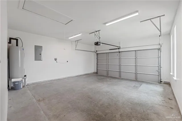 a bathroom with a granite countertop sink mirror and a