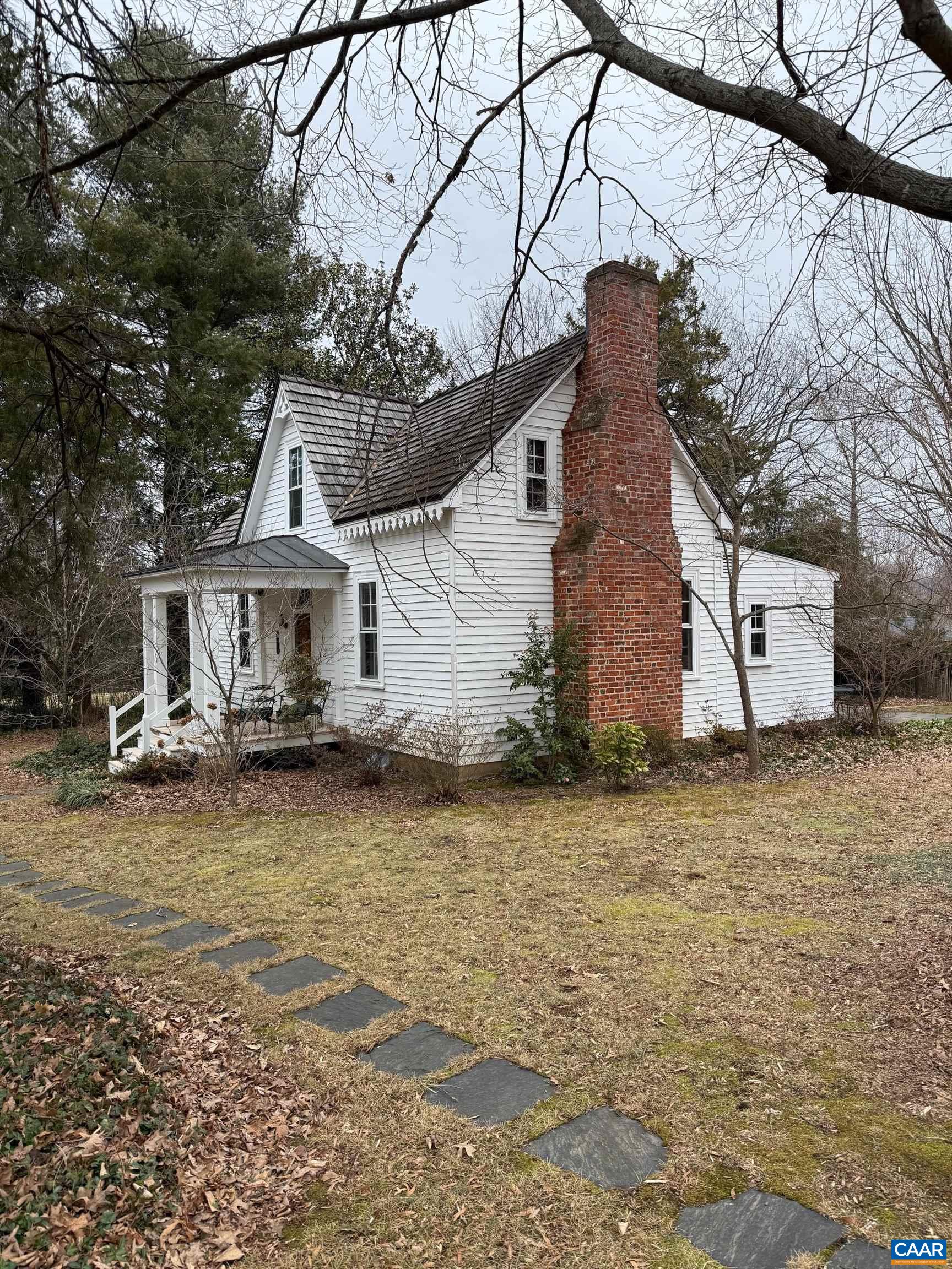 3123 Rabbit Valley Road North Garden, VA 22959 - Photo 1 of 2 a front view of a house with a yard