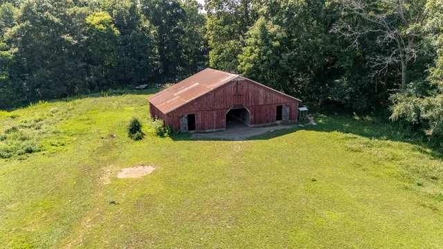a view of a swimming pool with an outdoor space and seating area