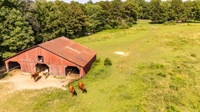 a view of a swimming pool with an outdoor space and seating area