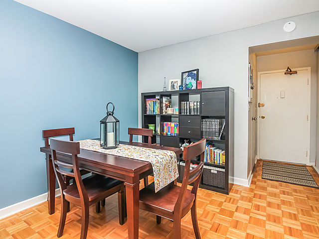 253 East Delaware Place, Unit 5E Chicago, IL 60611 - Photo 9 of 17 a view of a dining room with furniture
