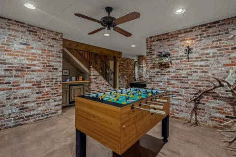 a outdoor space with lots of fruit on the wall