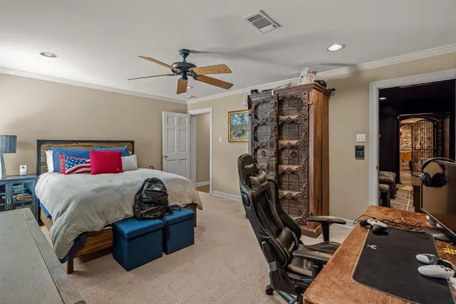 a bedroom with furniture and a bed