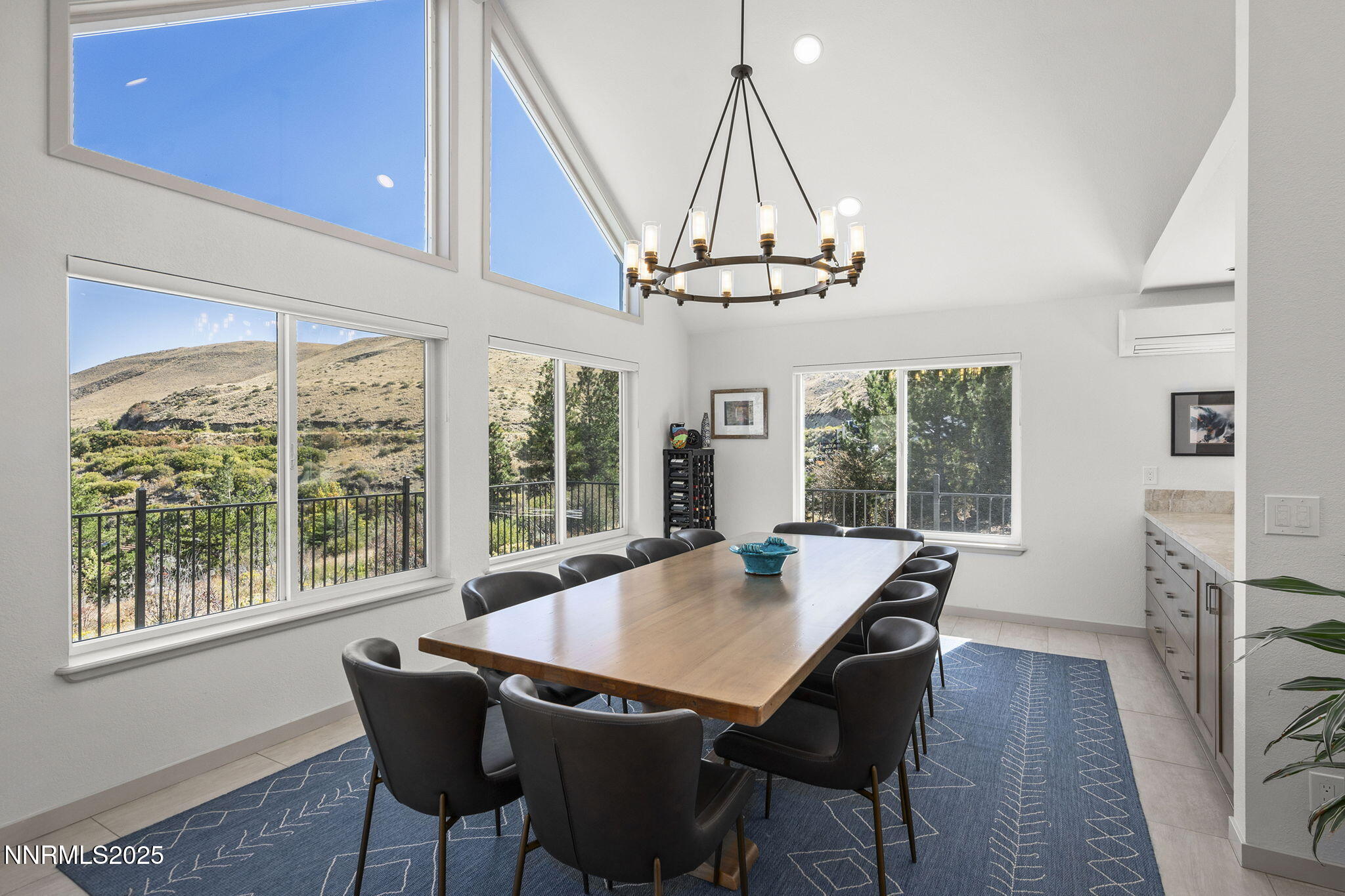 2885 Erminia Road Reno, NV 89523 - Photo 11 of 38 a view of a dining room with furniture window and wooden floor