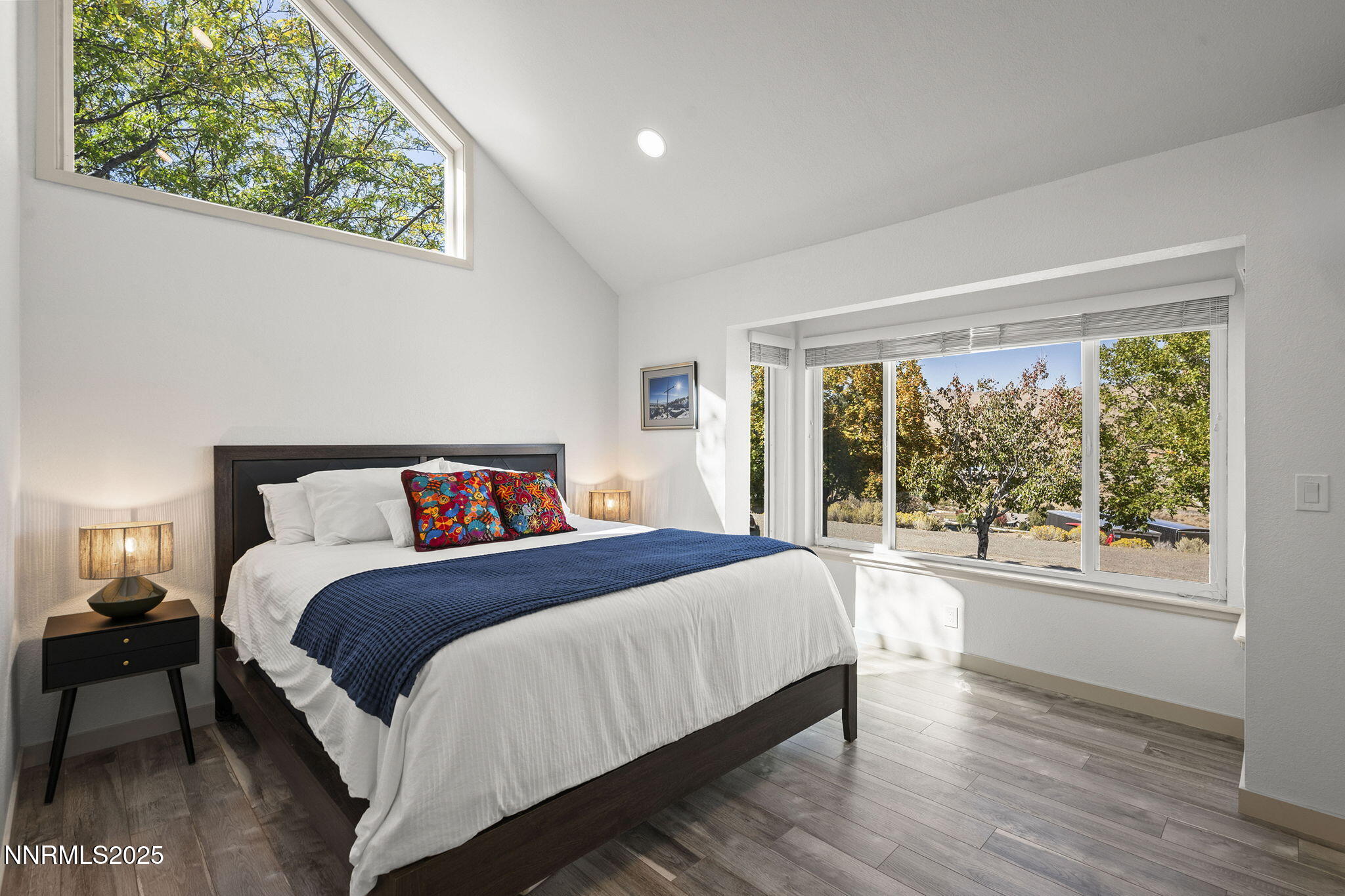 2885 Erminia Road Reno, NV 89523 - Photo 19 of 38 a bedroom with a large bed and a large window