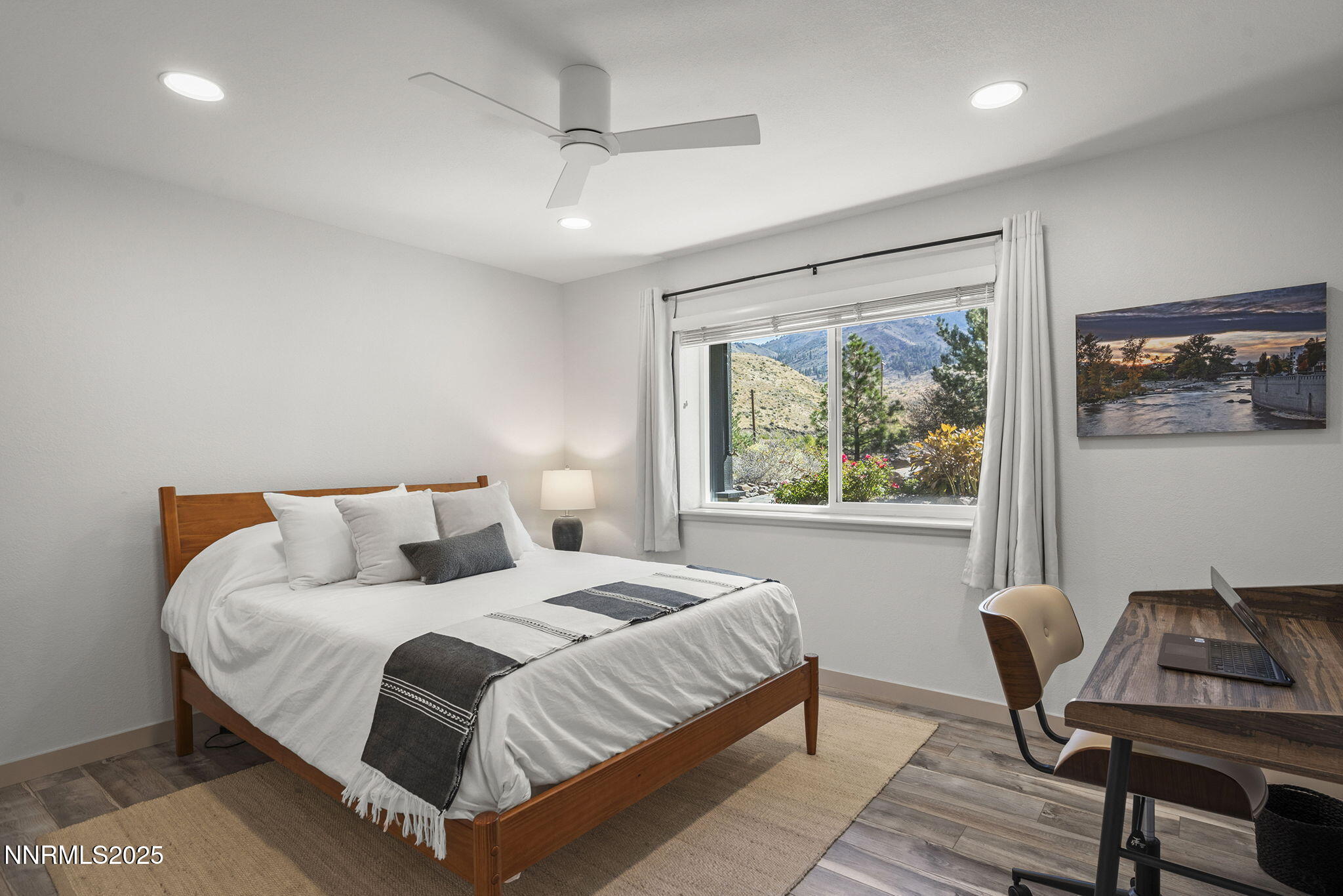 2885 Erminia Road Reno, NV 89523 - Photo 24 of 38 a bedroom with a bed and a window