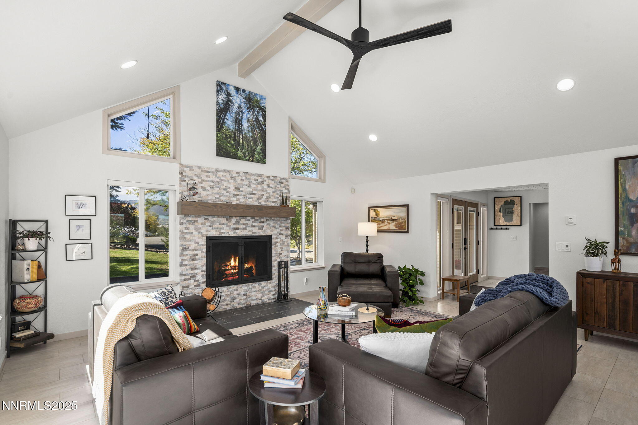 2885 Erminia Road Reno, NV 89523 - Photo 7 of 38 a living room with furniture and a fireplace