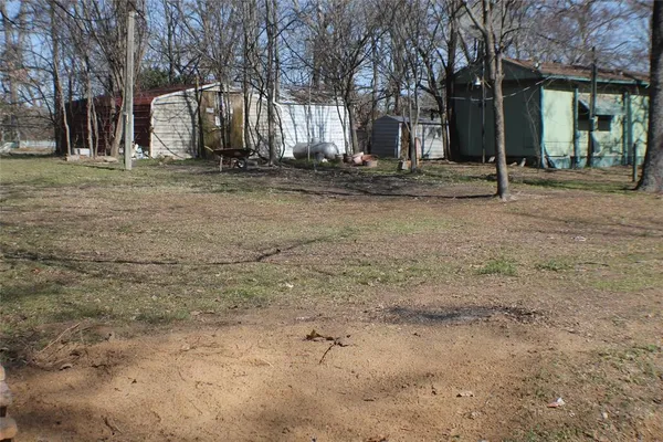 a backyard of a house with entertaining space