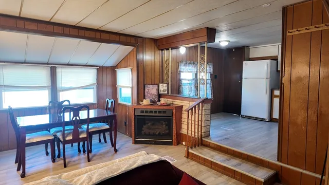 a view of a livingroom with furniture and window