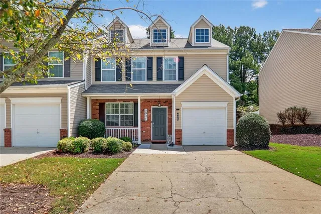 front view of a house with a yard