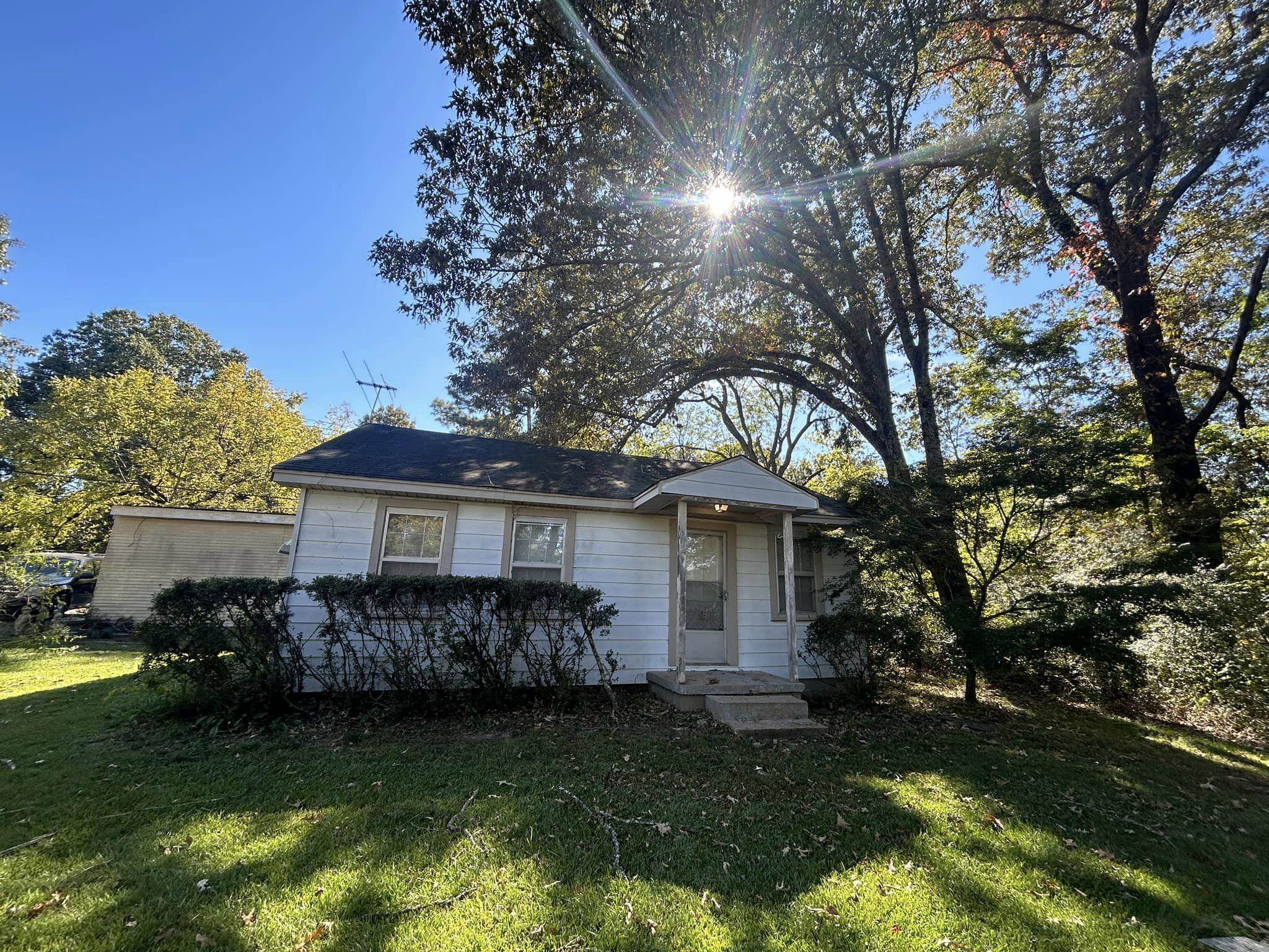 11361 Macon Road Eads, TN 38028 - Photo 2 of 15 a front view of a house with a garden