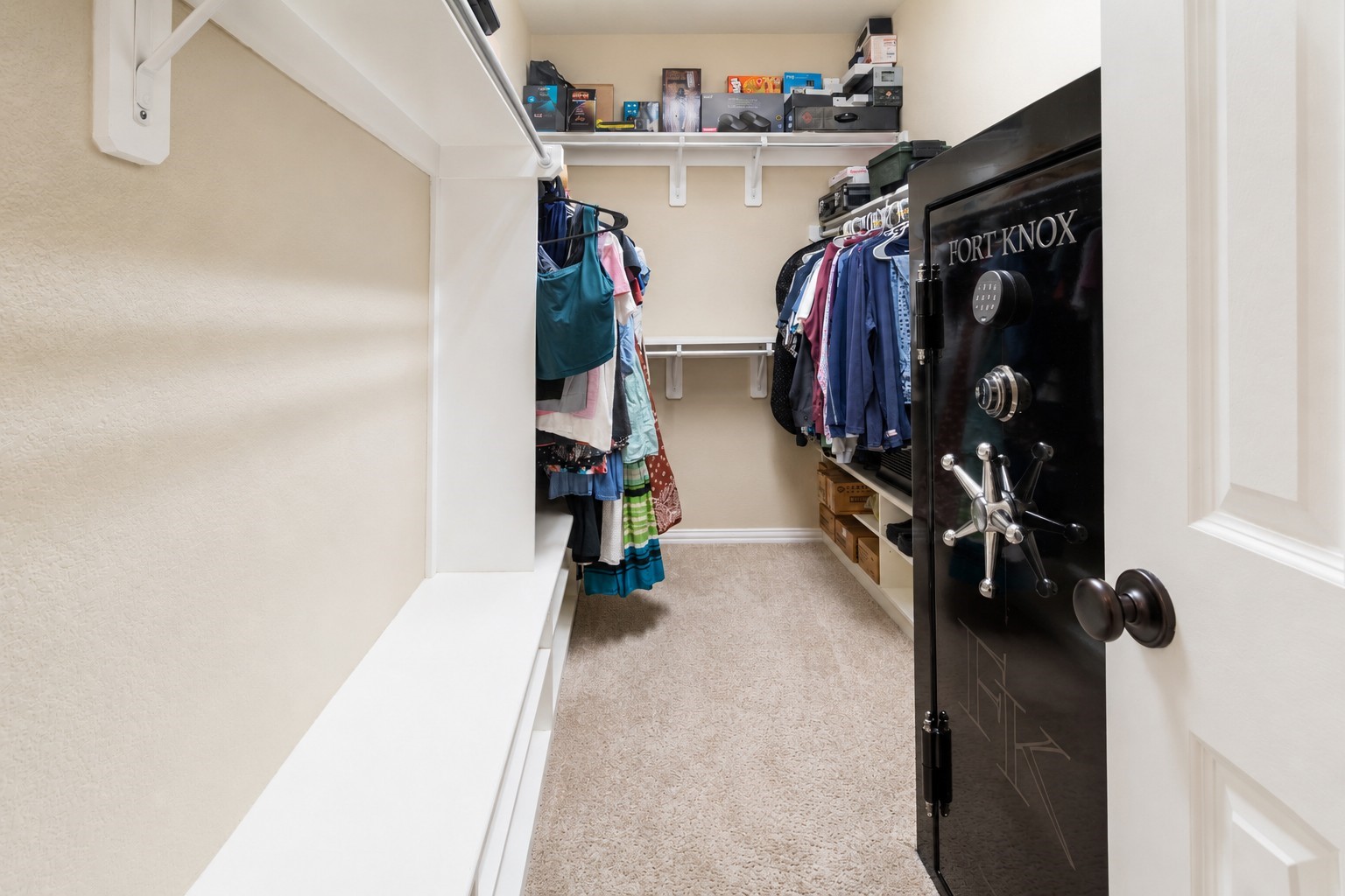 2326 Hamilton Pool Lane Friendswood, TX 77546 - Photo 25 of 49 a view of walk in closet with clothes and shoes
