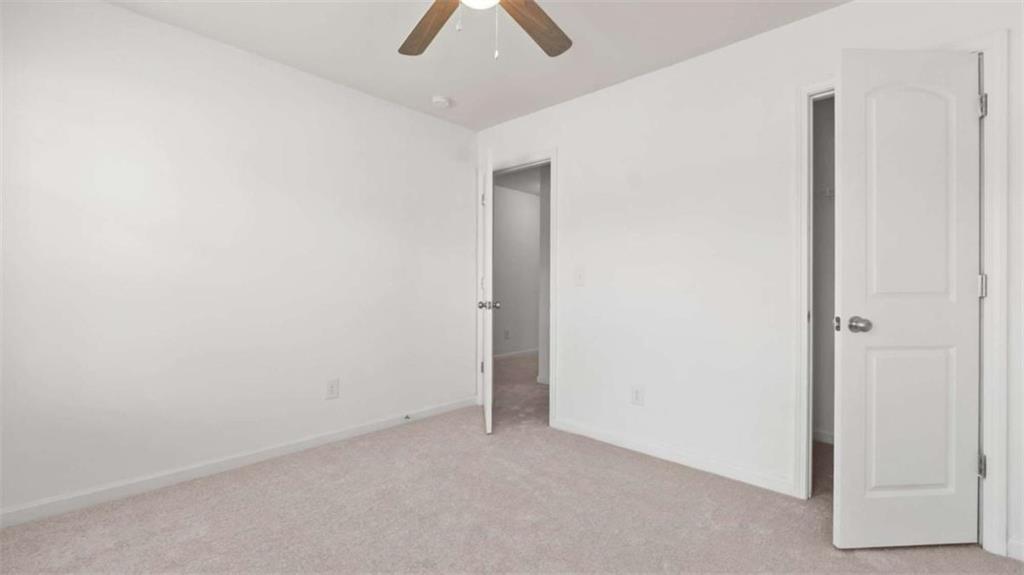31 Southfork Drive Rome, GA 30165 - Photo 12 of 24 an empty room with ceiling fan