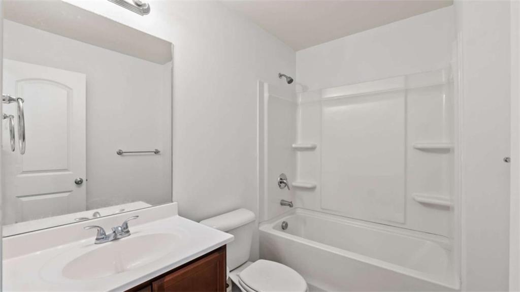 31 Southfork Drive Rome, GA 30165 - Photo 10 of 24 a bathroom with a sink toilet and shower