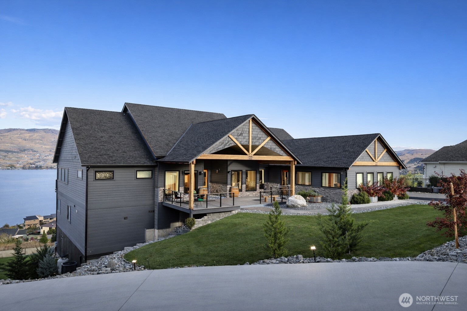 149 Clos Chevalle Road Chelan, WA 98816 - Photo 36 of 37 a front view of a house with a yard