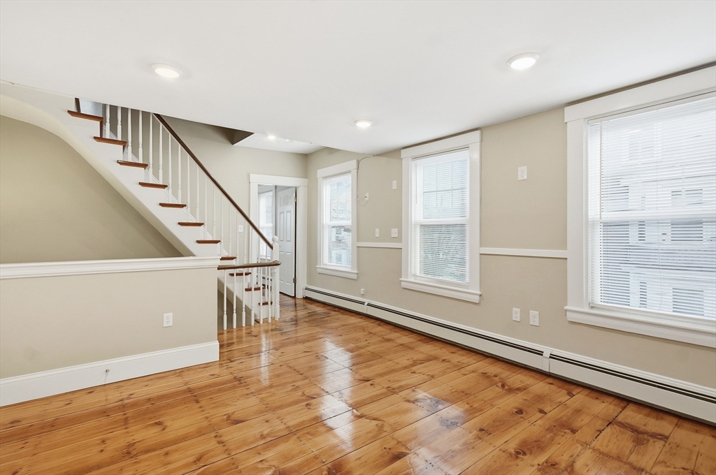 163-165 Chestnut Street Waltham, MA 02453 - Photo 15 of 41 a view of an entryway with wooden floor