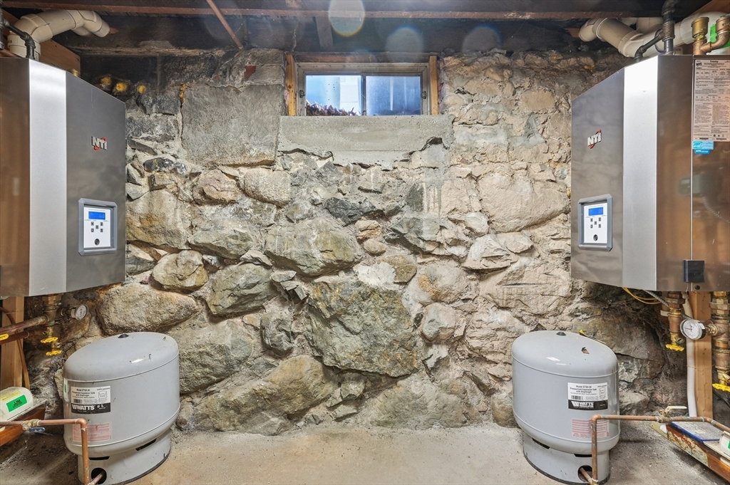 163-165 Chestnut Street Waltham, MA 02453 - Photo 37 of 41 a bathroom with a toilet and a shower