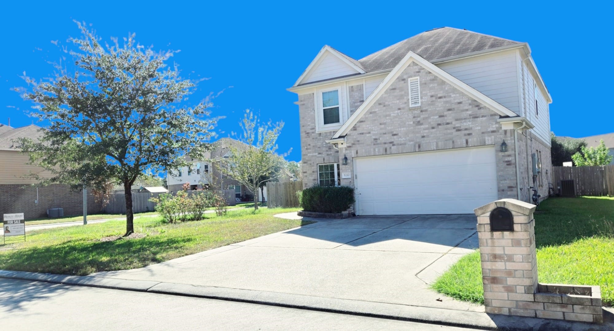 5110 Forest Terrace Drive Spring, TX 77373 - Photo 3 of 6 a front view of a house with a yard