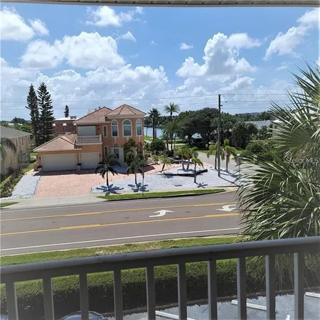 a view of a balcony with city view