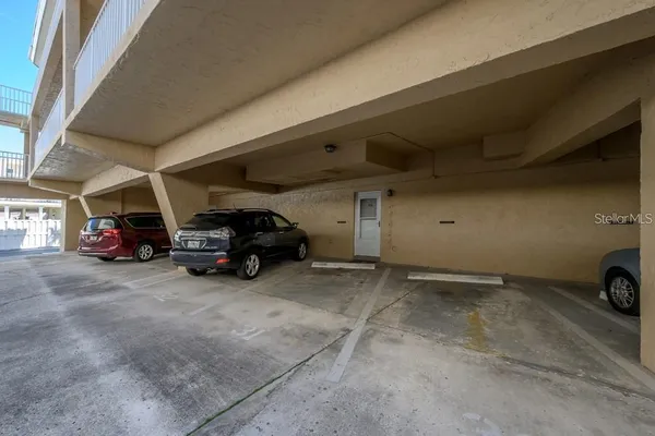 a room with furniture and musical instruments