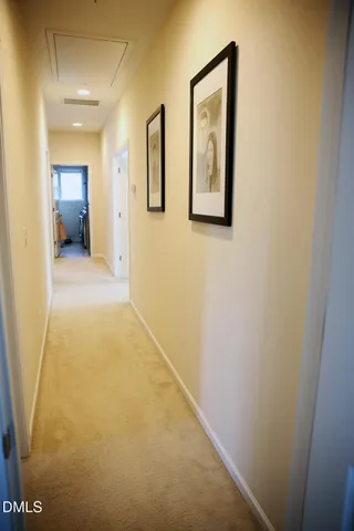 a view of hallway with livingroom