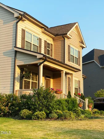 a view of a house with a swimming pool