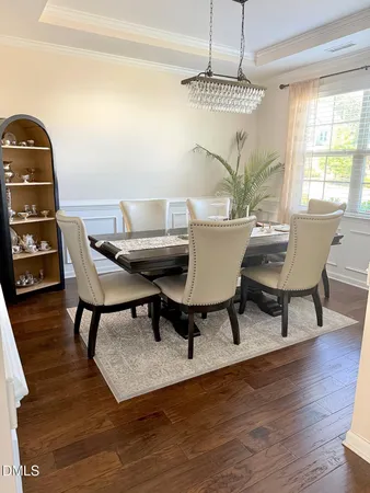 a workspace with furniture window and wooden floor