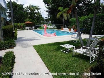 6590 North Ocean Boulevard, Unit 8 Ocean Ridge, FL 33435 - Photo 4 of 24 a view of an outdoor space and seating area