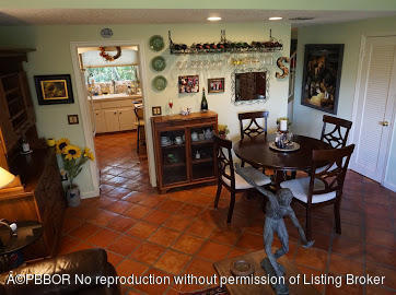 6590 North Ocean Boulevard, Unit 8 Ocean Ridge, FL 33435 - Photo 6 of 24 a view of a dining room with furniture
