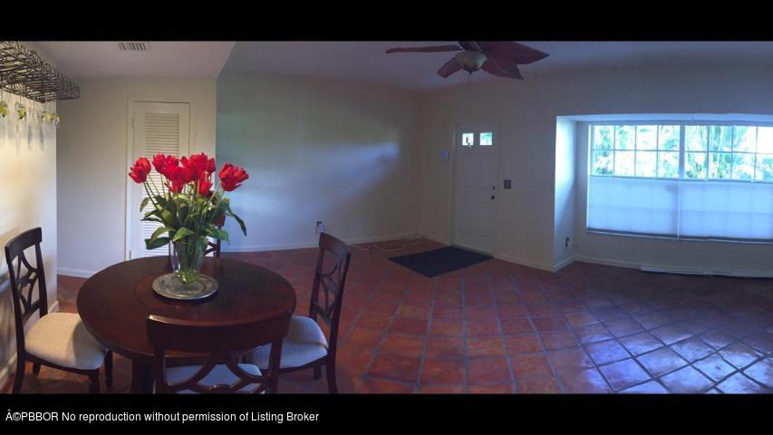 6590 North Ocean Boulevard, Unit 8 Ocean Ridge, FL 33435 - Photo 7 of 24 a view of a livingroom with furniture