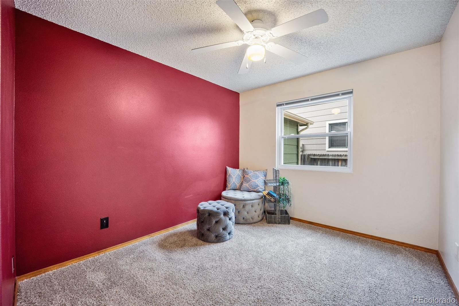 2035 Springcrest Road Colorado Springs, CO 80920 - Photo 18 of 39 an empty room with windows