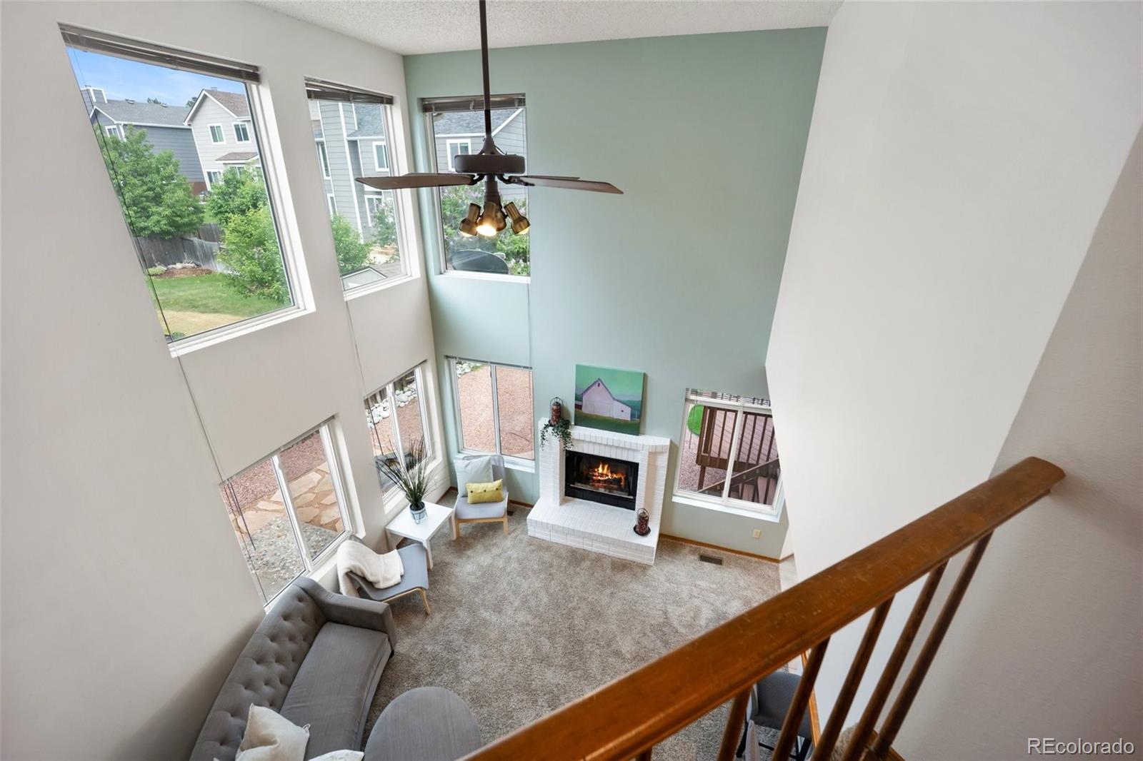 2035 Springcrest Road Colorado Springs, CO 80920 - Photo 25 of 39 a living room with furniture and a window