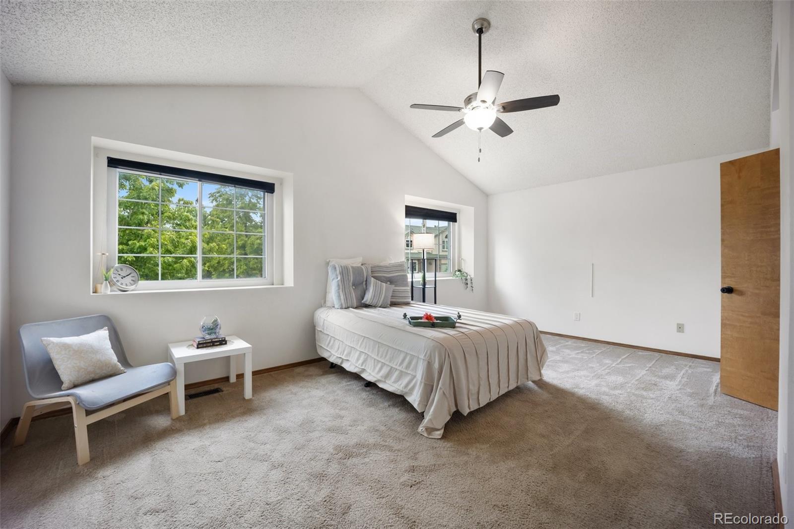 2035 Springcrest Road Colorado Springs, CO 80920 - Photo 26 of 39 a room with a bed and a window