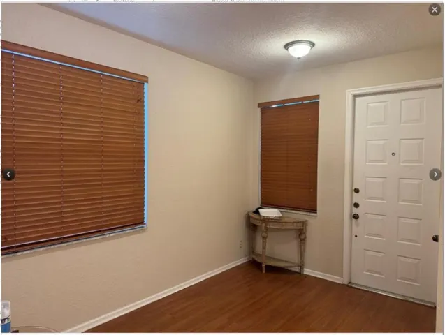 a view of a room that has a bench in it